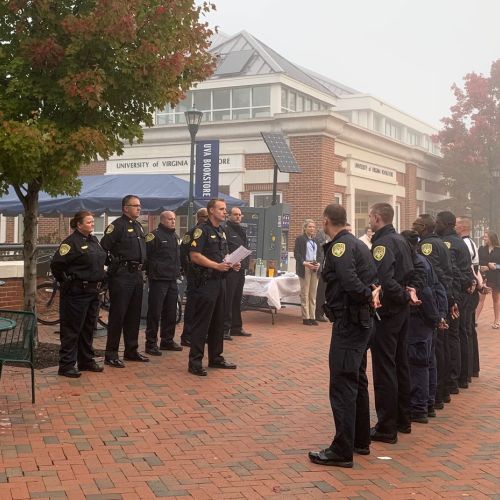 Police standing in row on UVA grounds