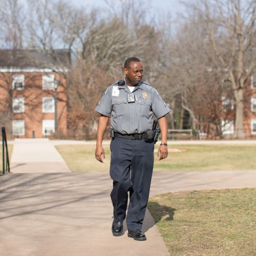 Security employee walking on grounds